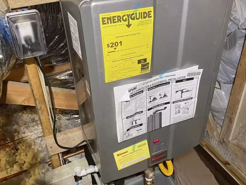 Rinnai tankless water heater installed in an attic with new venting and gas line